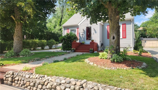 788 Cass Ave, Woonsocket, RI 02895 - view of property hidden behind natural elements with a front yard