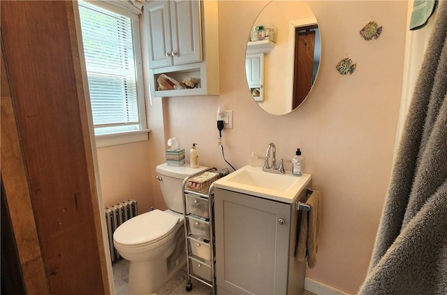 788 Cass Ave, Woonsocket, RI 02895 - half bathroom with radiator heating unit, plenty of natural light, and vanity