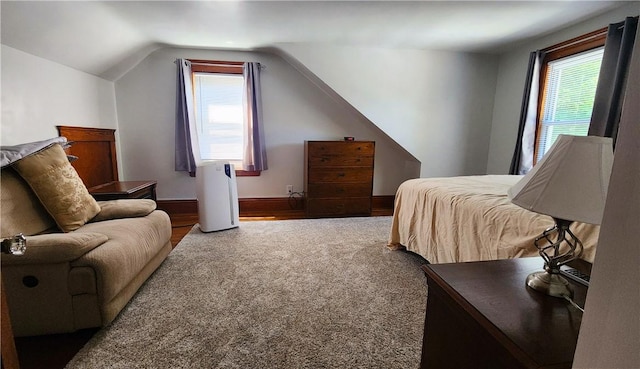 788 Cass Ave, Woonsocket, RI 02895 - carpeted bedroom featuring vaulted ceiling and multiple windows