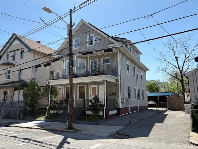282 Oxford St, Providence, RI 02905 - view of front of home featuring a balcony and a porch
