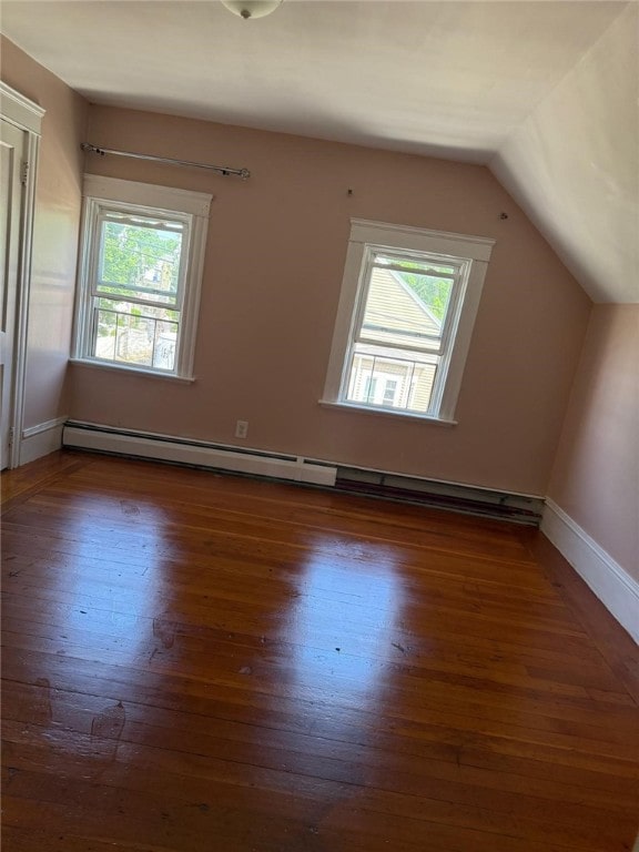 282 Oxford St, Providence, RI 02905 - bonus room with baseboard heating, wood finished floors, and vaulted ceiling
