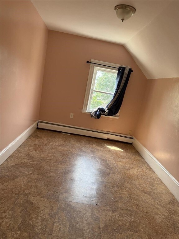 282 Oxford St, Providence, RI 02905 - bonus room with baseboard heating and lofted ceiling