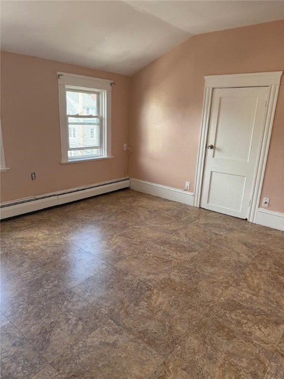 282 Oxford St, Providence, RI 02905 - unfurnished room with a baseboard radiator and vaulted ceiling