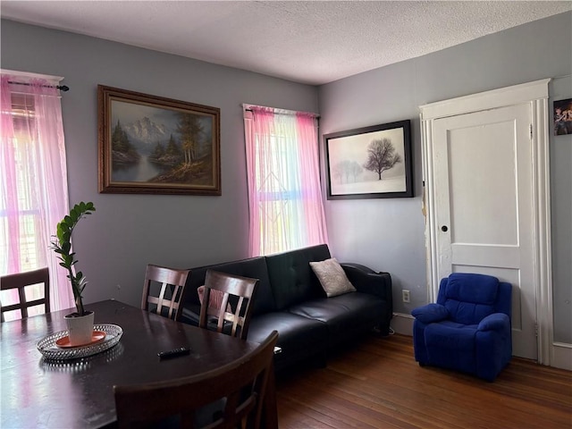 282 Oxford St, Providence, RI 02905 - dining area with wood finished floors and a textured ceiling