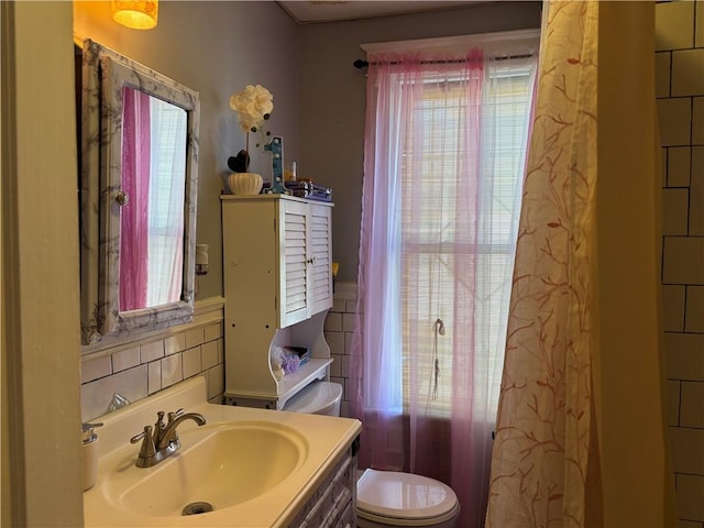 282 Oxford St, Providence, RI 02905 - bathroom featuring vanity and plenty of natural light
