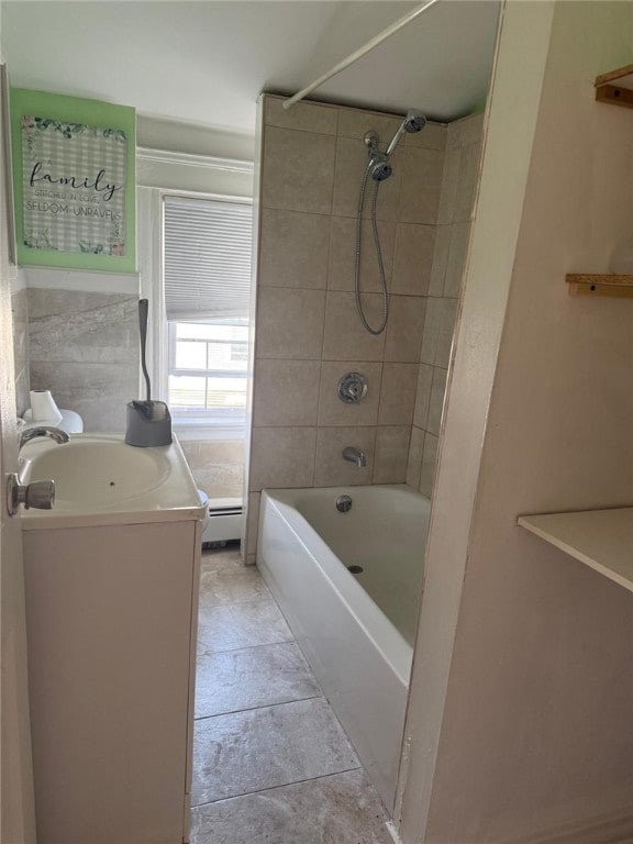 282 Oxford St, Providence, RI 02905 - full bath featuring baseboard heating, vanity, shower / bath combination, and stone finish flooring