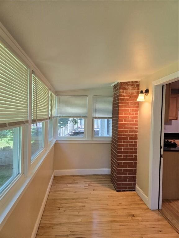 7 Edge St, West Warwick, RI 02893 - unfurnished sunroom with hardwood / wood-style floors