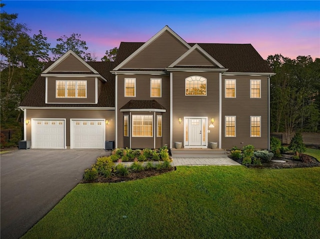 3 Kelsey Eden Way, Cumberland, RI 02864 - view of front of house with driveway, a garage, and a front yard