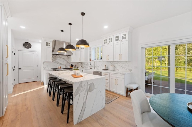 3 Kelsey Eden Way, Cumberland, RI 02864 - kitchen featuring wall chimney exhaust hood, backsplash, white cabinets, a kitchen breakfast bar, and recessed lighting