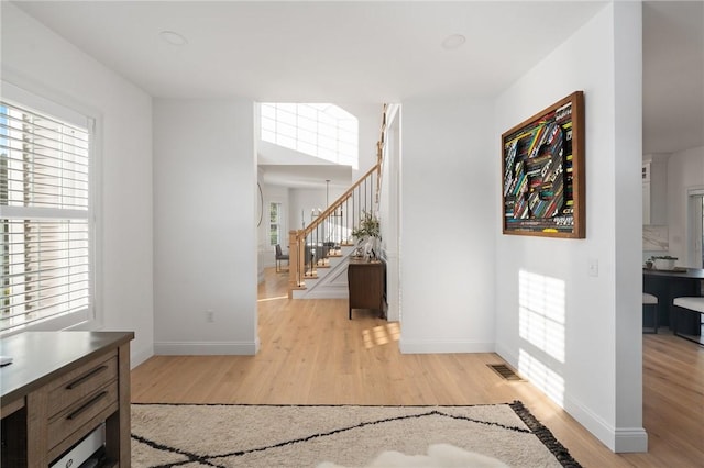 3 Kelsey Eden Way, Cumberland, RI 02864 - hall with light wood-type flooring and stairs