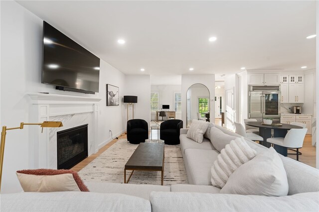 3 Kelsey Eden Way, Cumberland, RI 02864 - living room featuring light wood finished floors, recessed lighting, and a fireplace