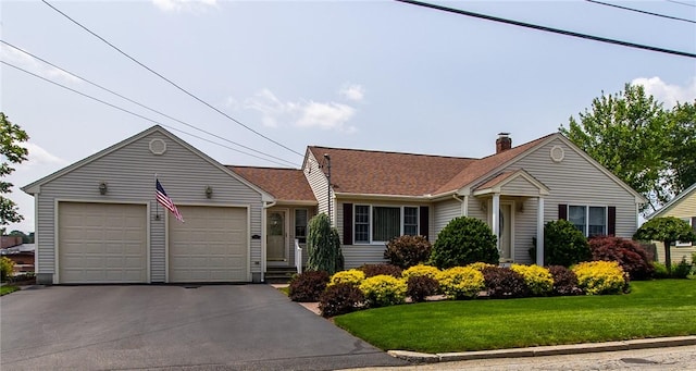 136 Woodward Rd, Providence, RI 02904 - ranch-style home with a front yard, a chimney, driveway, and a garage