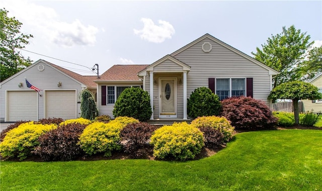 136 Woodward Rd, Providence, RI 02904 - view of front of property with a garage and a front yard