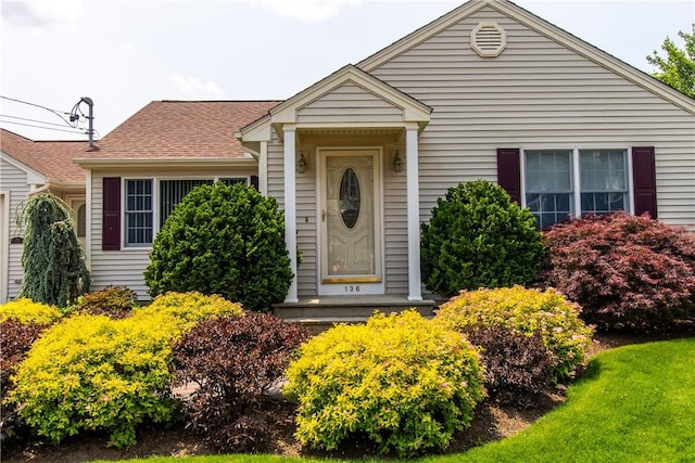 136 Woodward Rd, Providence, RI 02904 - view of front of house with a front lawn