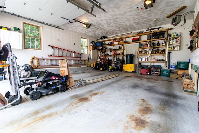 136 Woodward Rd, Providence, RI 02904 - garage featuring a garage door opener