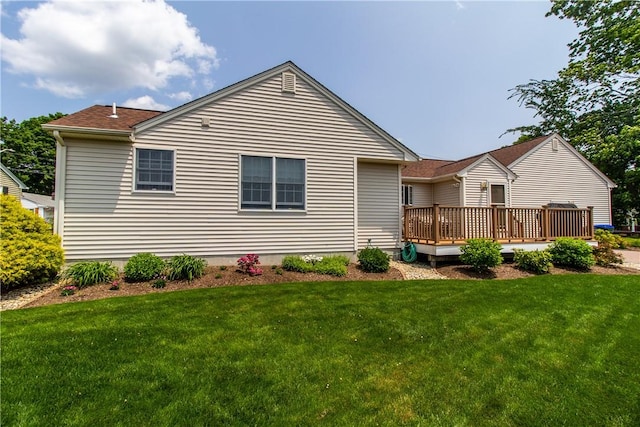 136 Woodward Rd, Providence, RI 02904 - back of property with a wooden deck and a yard