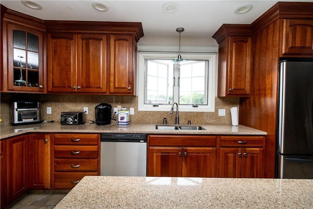 136 Woodward Rd, Providence, RI 02904 - kitchen featuring appliances with stainless steel finishes, backsplash, light stone counters, and recessed lighting