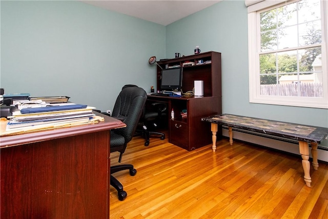 136 Woodward Rd, Providence, RI 02904 - office space with light wood-type flooring and a baseboard heating unit