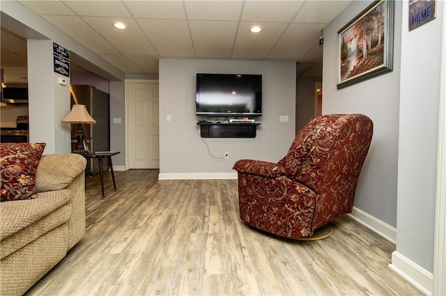 136 Woodward Rd, Providence, RI 02904 - living area with wood finished floors, a drop ceiling, and recessed lighting