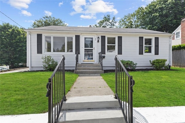 22 Hillcrest Dr, West Warwick, RI 02893 - view of front of house with entry steps and a front yard