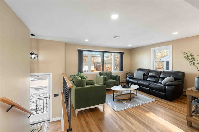 6 Flanders St, Johnston, RI 02919 - living room featuring wood finished floors, recessed lighting, and a baseboard radiator