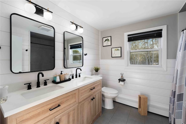 6 Flanders St, Johnston, RI 02919 - full bathroom featuring double vanity, tile patterned flooring, a baseboard heating unit, wooden walls, and a shower with shower curtain