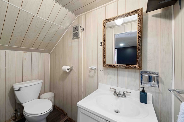 6 Flanders St, Johnston, RI 02919 - half bathroom with vaulted ceiling, wooden walls, and vanity
