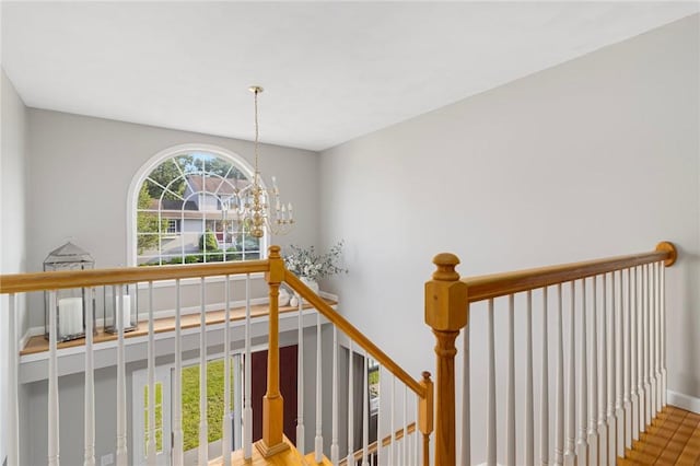 29 Gilcrest Dr, West Warwick, RI 02893 - stairs featuring wood finished floors and a chandelier