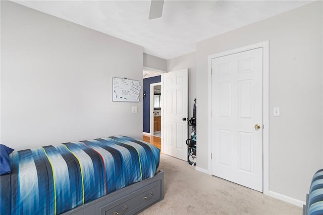 29 Gilcrest Dr, West Warwick, RI 02893 - bedroom with light carpet and a ceiling fan