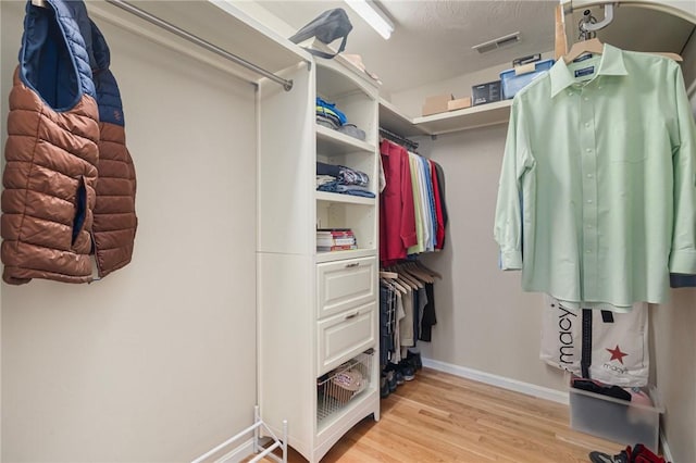 29 Gilcrest Dr, West Warwick, RI 02893 - spacious closet featuring light wood-style flooring