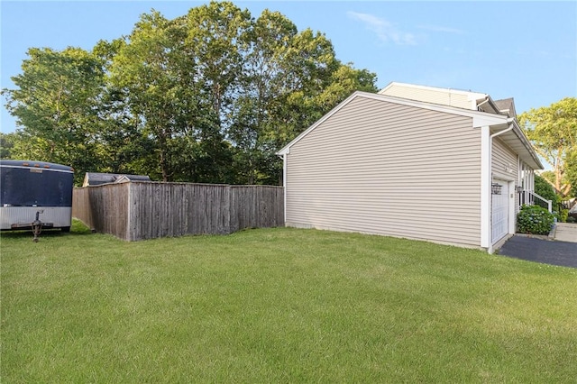 29 Gilcrest Dr, West Warwick, RI 02893 - view of yard with driveway and a garage