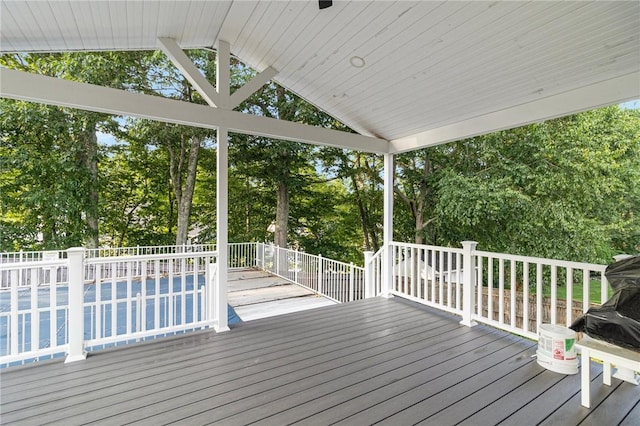 29 Gilcrest Dr, West Warwick, RI 02893 - wooden deck with view of scattered trees and a swimming pool