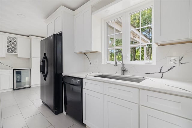 29 Gilcrest Dr, West Warwick, RI 02893 - kitchen featuring black appliances, wine cooler, decorative backsplash, white cabinets, and light stone counters