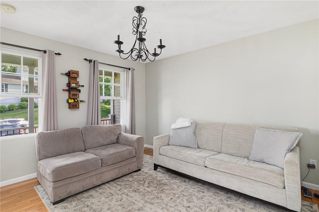 29 Gilcrest Dr, West Warwick, RI 02893 - living room with a chandelier and wood finished floors
