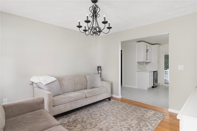 29 Gilcrest Dr, West Warwick, RI 02893 - living area featuring a chandelier and light wood-type flooring