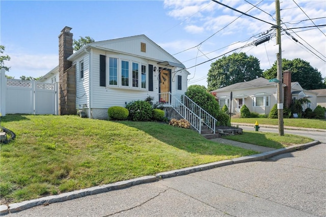 59 Waite St, Providence, RI 02908 - view of front facade with a chimney