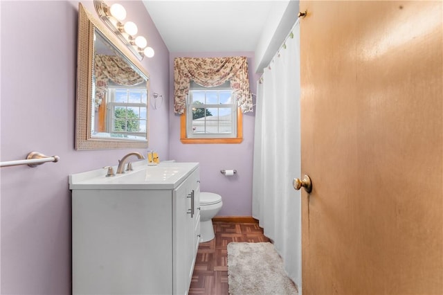 59 Waite St, Providence, RI 02908 - bathroom featuring vanity and toilet