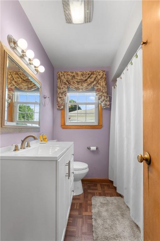 59 Waite St, Providence, RI 02908 - full bathroom featuring vanity, plenty of natural light, and a shower with curtain