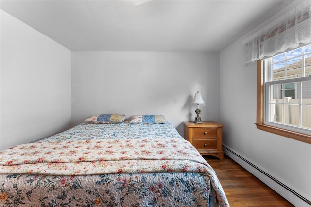 59 Waite St, Providence, RI 02908 - bedroom featuring a baseboard radiator and wood finished floors