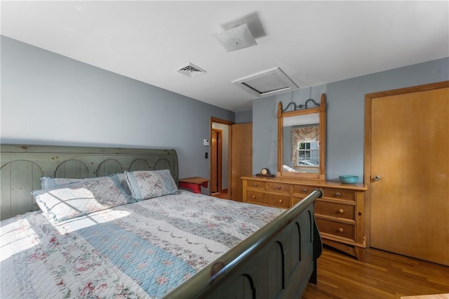 59 Waite St, Providence, RI 02908 - bedroom featuring attic access and wood finished floors