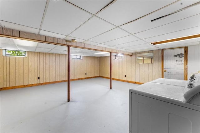 59 Waite St, Providence, RI 02908 - basement featuring a drop ceiling and wooden walls