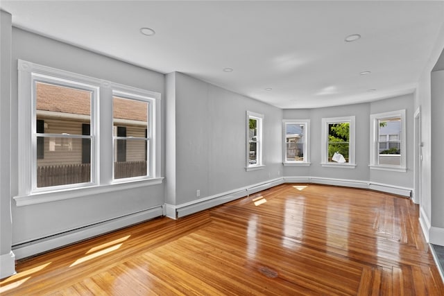 33 Marion Ave, Providence, RI 02905 - spare room with baseboard heating, wood finished floors, and recessed lighting