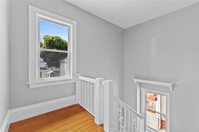 33 Marion Ave, Providence, RI 02905 - corridor with an upstairs landing, plenty of natural light, and wood finished floors