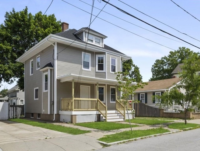 33 Marion Ave, Providence, RI 02905 - traditional style home featuring a porch and a chimney