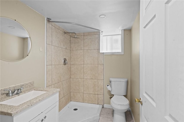18 Ortoleva Dr, Providence, RI 02909 - bathroom with vanity, a tile shower, and tile patterned floors