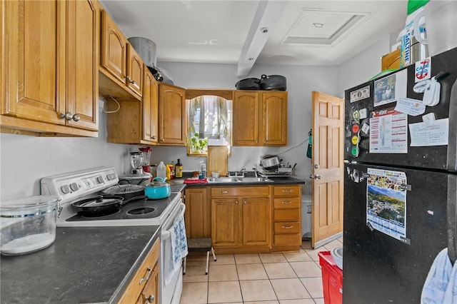 18 Ortoleva Dr, Providence, RI 02909 - kitchen featuring white electric stove, dark countertops, freestanding refrigerator, light tile patterned floors, and beam ceiling