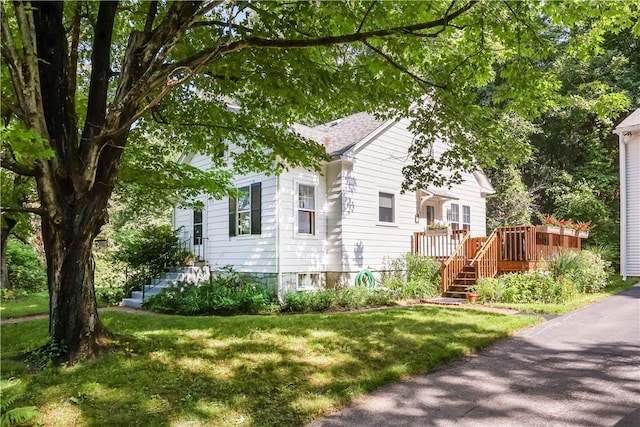 178 Lippitt Ave, Cranston, RI 02921 - view of front of house with stairway, a deck, and a front lawn