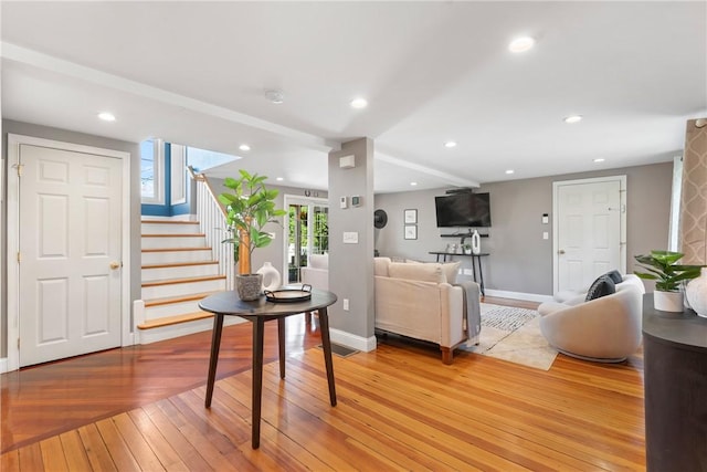 12 Windward Cir, Warwick, RI 02889 - living area with stairs, light wood finished floors, and recessed lighting