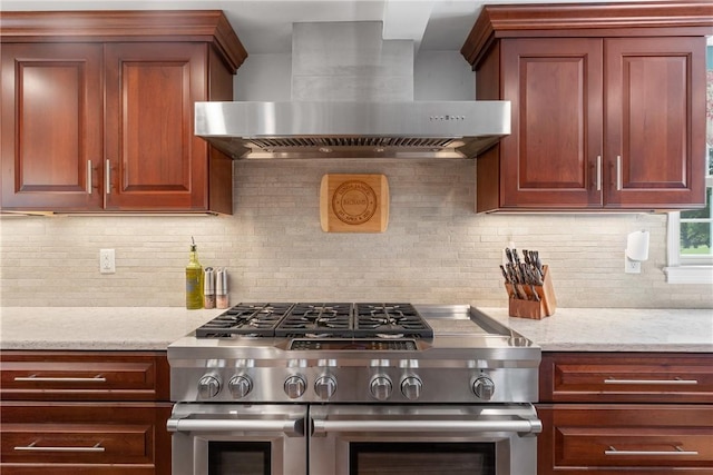 12 Windward Cir, Warwick, RI 02889 - kitchen featuring wall chimney exhaust hood, double oven range, decorative backsplash, and light stone countertops