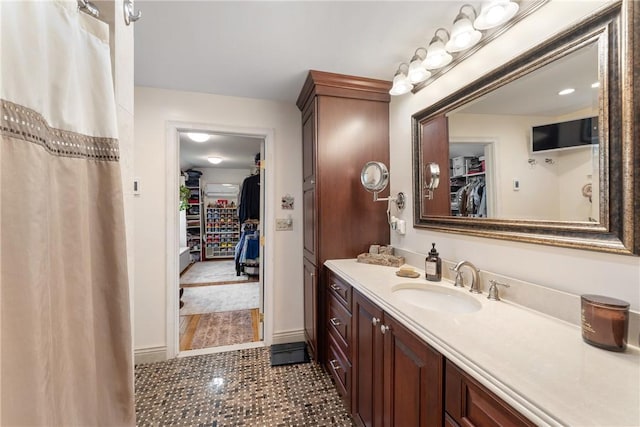 12 Windward Cir, Warwick, RI 02889 - full bathroom with a spacious closet and vanity